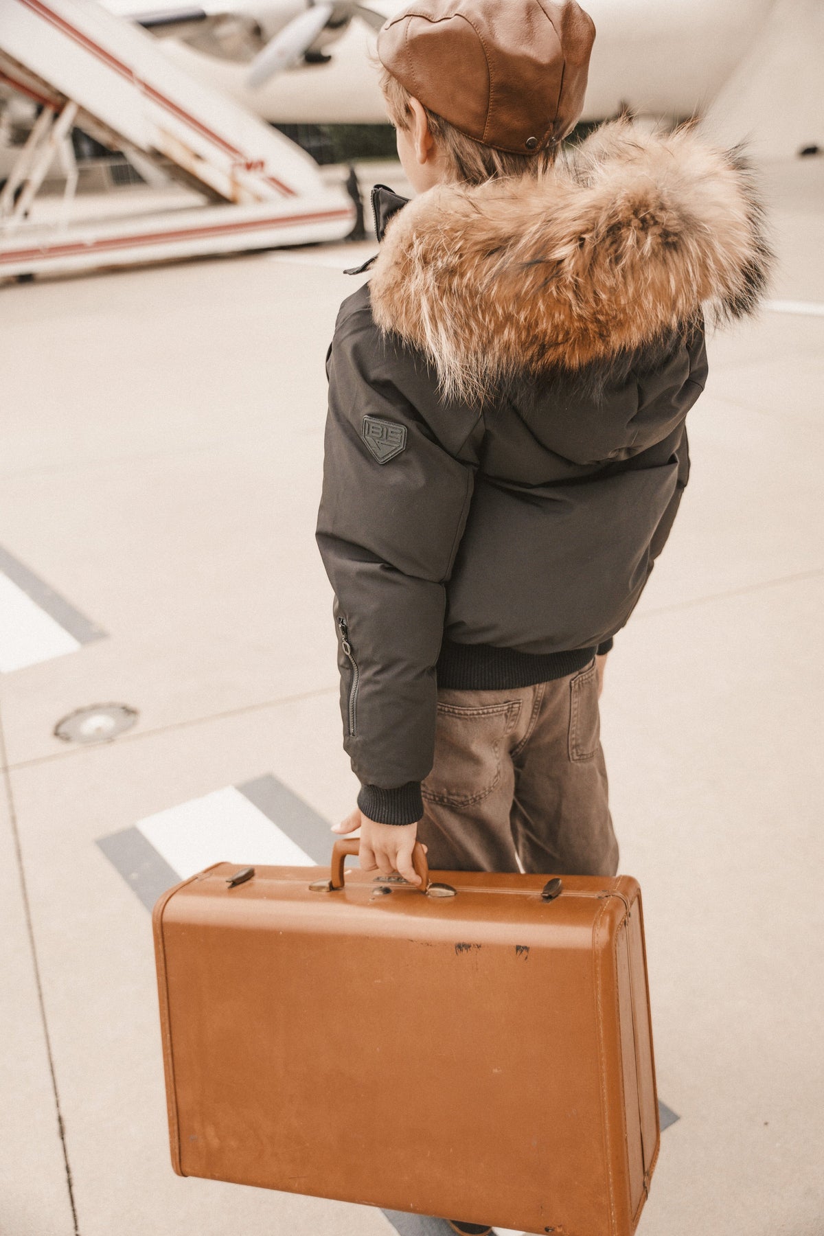 The Northbound Boys' Bomber with Shoulder Flaps - Black Coat IBIS Outerwear