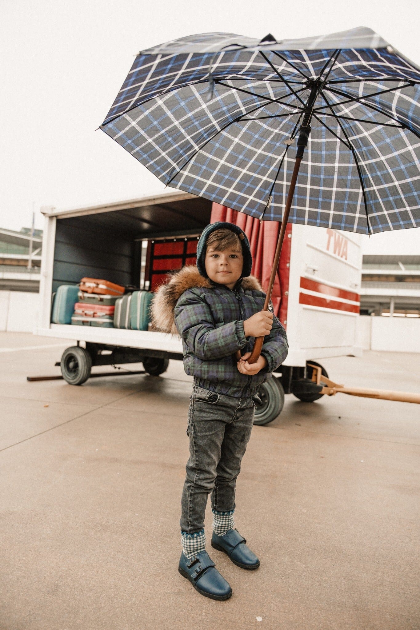 IBIS Overland boys kangaroo pocket coat in plaid - umbrella lifestyle view