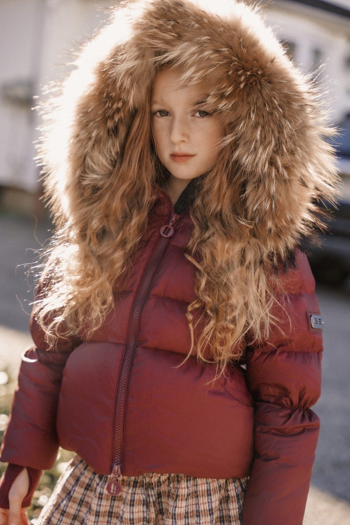 The Waypoint Girls Peplum Coat in Burgundy — lifestyle photo