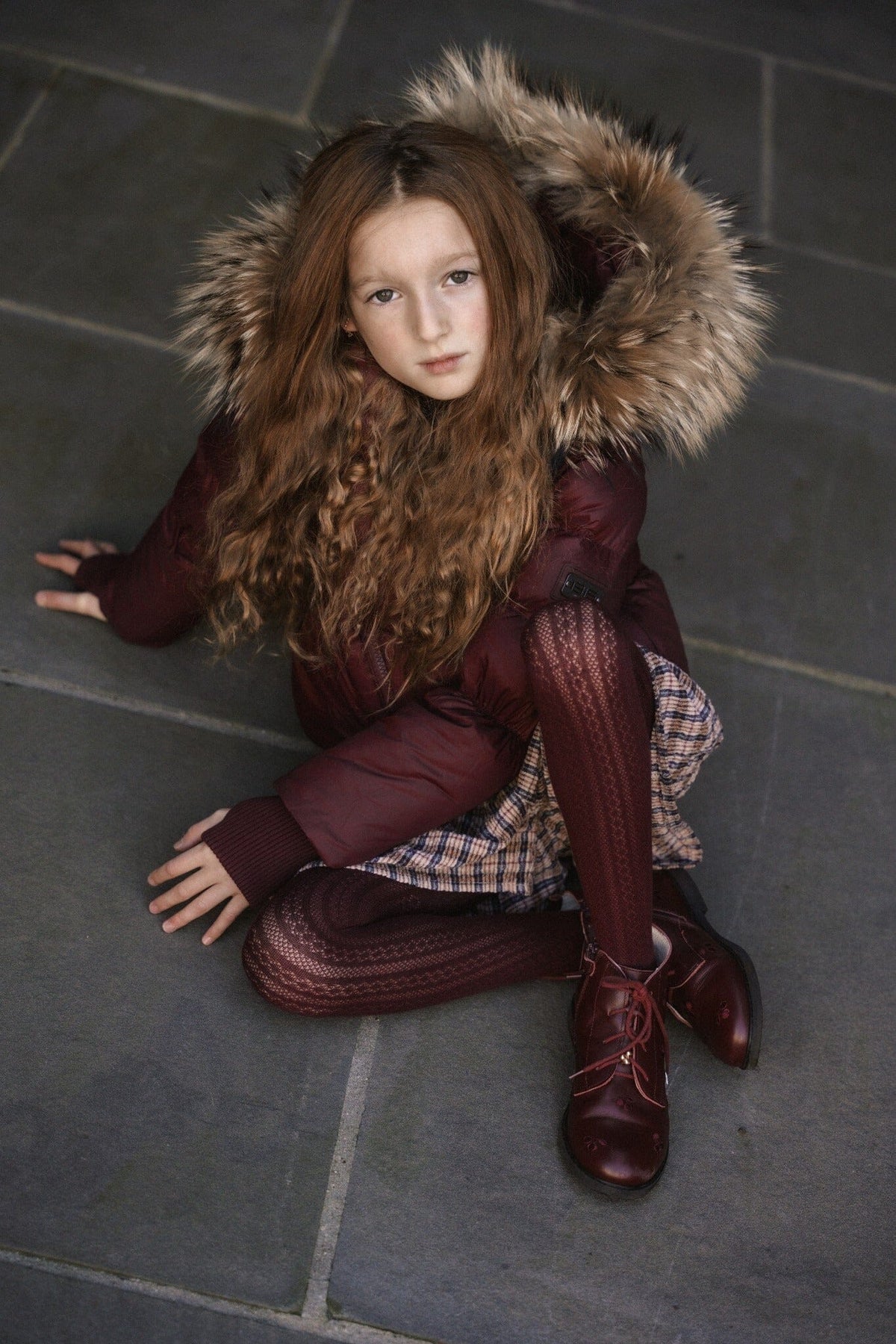 The Waypoint Girls Peplum Coat in Burgundy — lifestyle photo