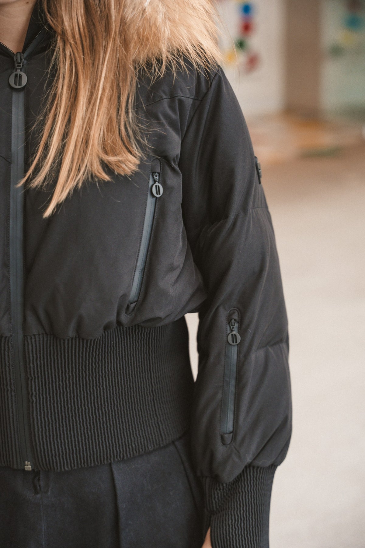 IBIS Ascent Teen Tall Waistband Coat in Black Matte zipper and sleeve pocket detail