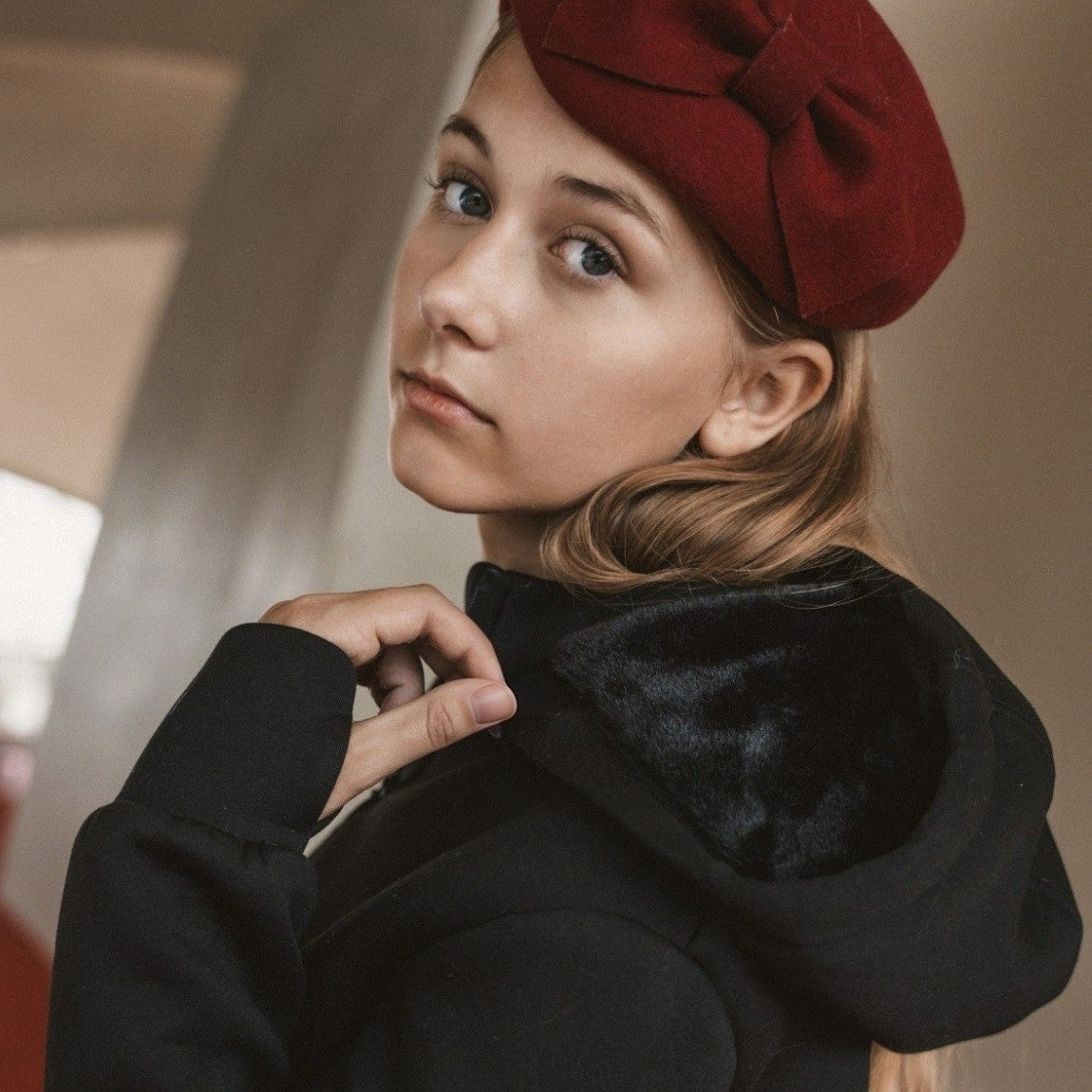 IBIS jackets and hoodies - teen in black hoodie jacket and red beret
